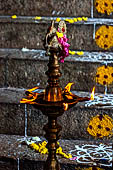 Worship and puja offerings inside the Swamimalai temple.